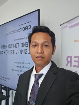 Mao Hieng in a suit at a CADT event